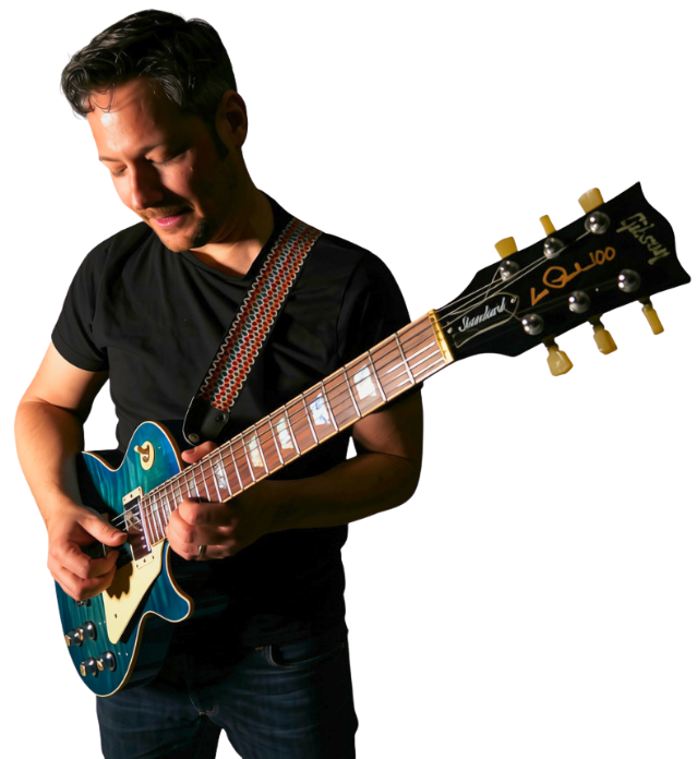 Udi Glaser playing his blue Les Paul guitar Udi Glaser guitar composition and improvisation teacher 1 edited